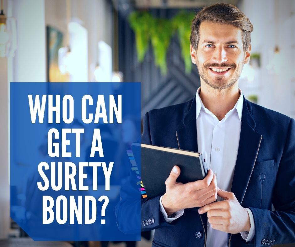 Who Can Get A Surety Bond? - A surety agent holding a notes. Smiling surety agent inside the surety company.